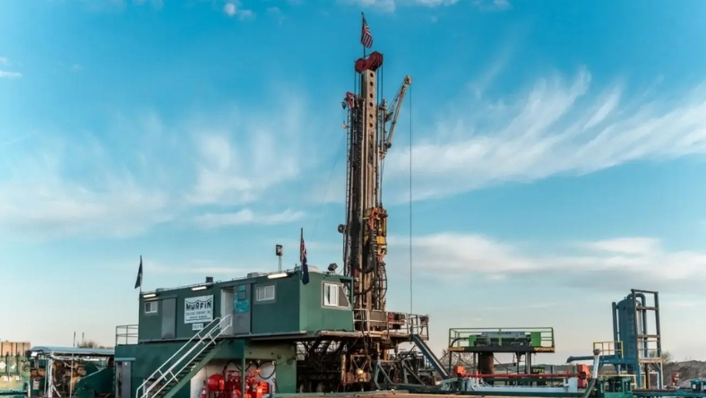 Onshore drilling rig at energy exploration site